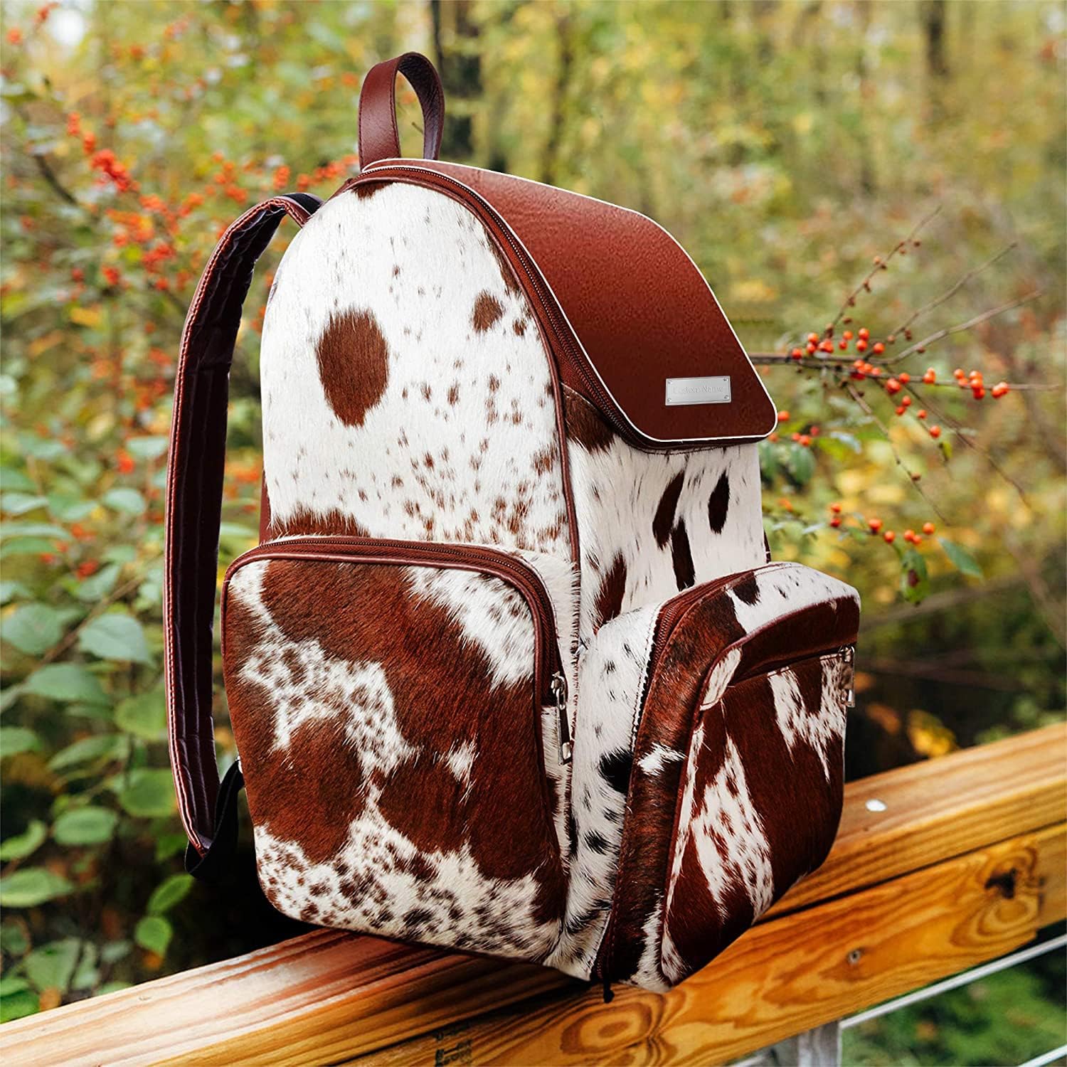 UGFashions Cowhide Diaper Bag Backpack Brown White